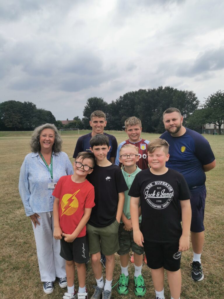 Deputy Commissioner with young people attending multi sports Space activity