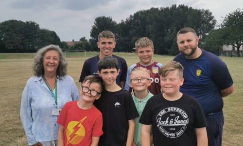 Deputy Commissioner with young people attending multi sports Space activity
