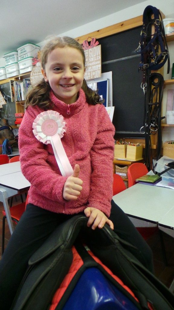 Ella Westwood, age seven, with her rosette.