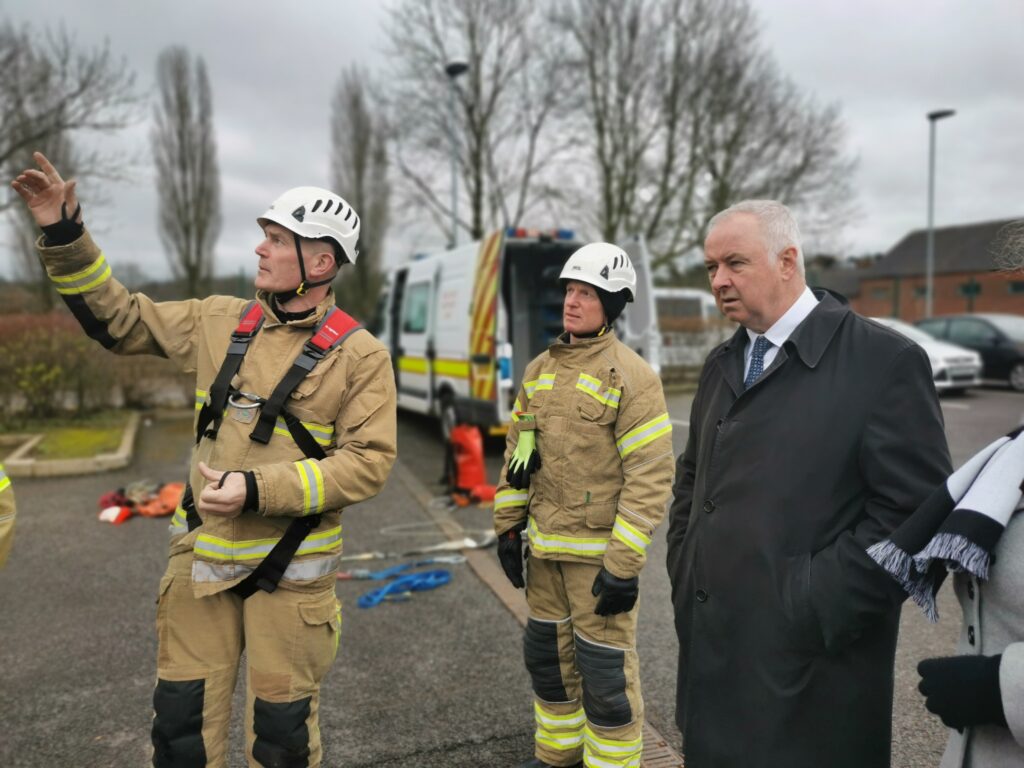 Commissioner Ben Adams stood with firefighters