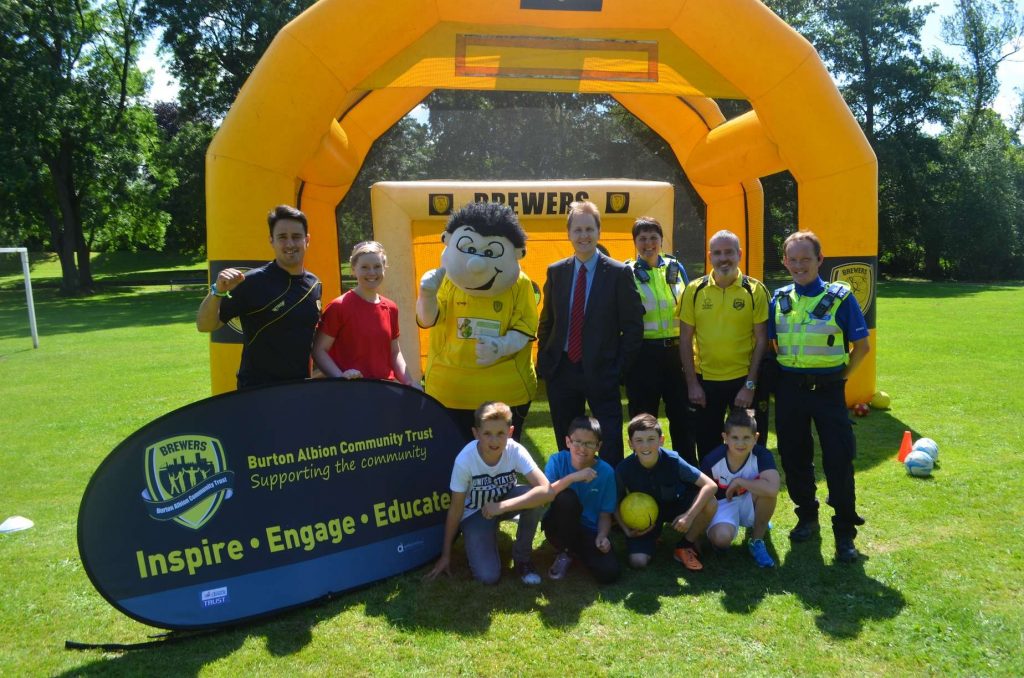 PCC Matthew Ellis with Burton Albion Community Trust partners of Burton Albion and youngsters involved in the penatly shoot