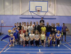 PCC Matthew Ellis with youngsters involved in basketball