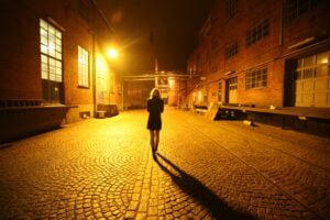 Woman walking down a street